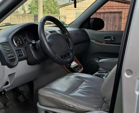 Серый Киа Карнивал, объемом двигателя 2.9 л и пробегом 340 тыс. км за 2129 $, фото 3 на Automoto.ua