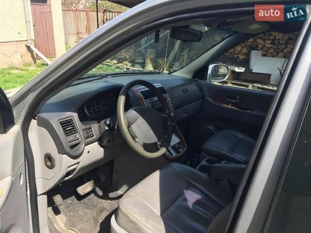Серый Киа Карнивал, объемом двигателя 2.9 л и пробегом 390 тыс. км за 4800 $, фото 7 на Automoto.ua