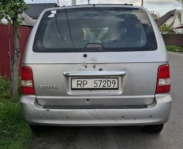 Серый Киа Карнивал, объемом двигателя 2.9 л и пробегом 340 тыс. км за 2129 $, фото 1 на Automoto.ua