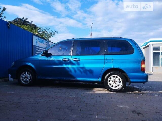 Синій Кіа Карнівал, об'ємом двигуна 2.92 л та пробігом 300 тис. км за 1999 $, фото 4 на Automoto.ua