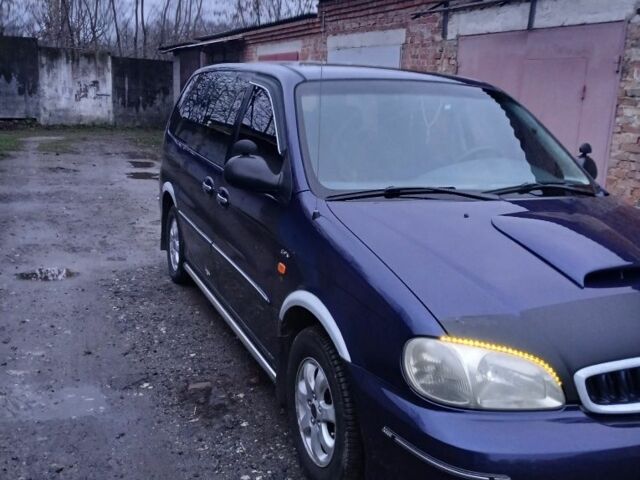Синій Кіа Карнівал, об'ємом двигуна 2.9 л та пробігом 396 тис. км за 2100 $, фото 1 на Automoto.ua