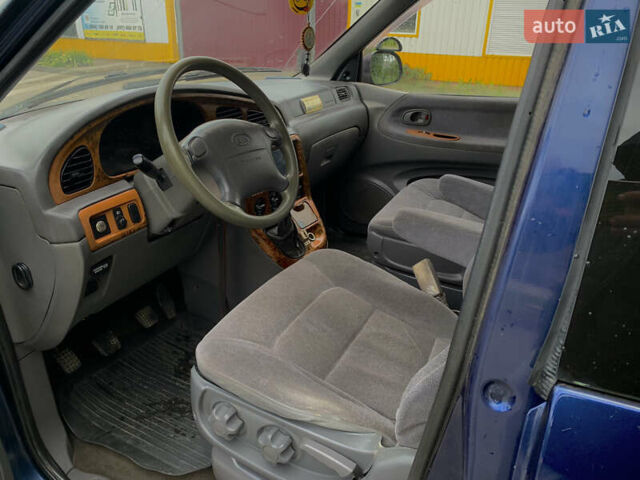 Синий Киа Карнивал, объемом двигателя 2.9 л и пробегом 230 тыс. км за 2600 $, фото 4 на Automoto.ua