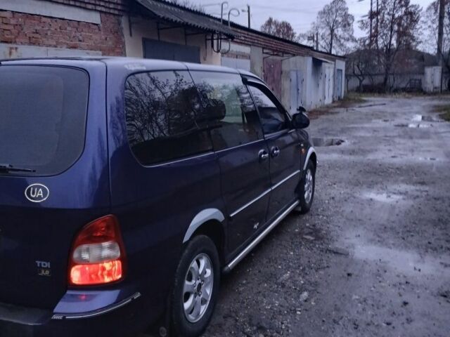 Синій Кіа Карнівал, об'ємом двигуна 2.9 л та пробігом 396 тис. км за 2100 $, фото 3 на Automoto.ua