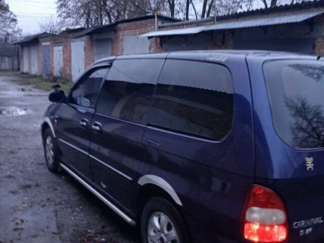 Синій Кіа Карнівал, об'ємом двигуна 2.9 л та пробігом 396 тис. км за 2100 $, фото 2 на Automoto.ua