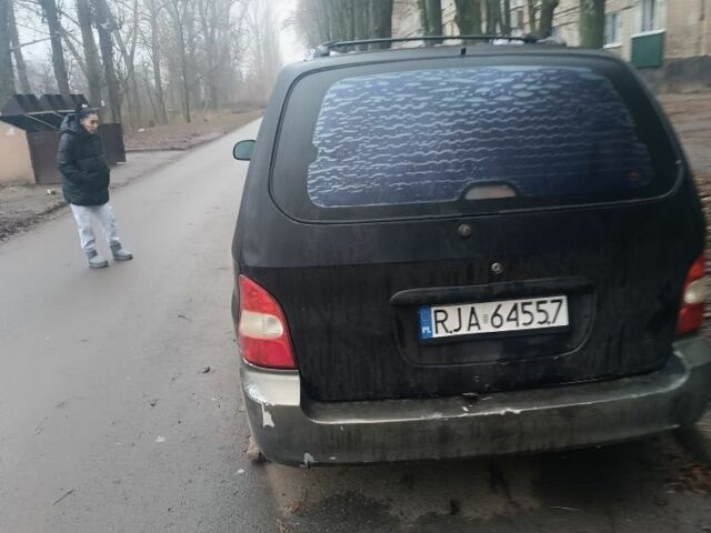 Синий Киа Карнивал, объемом двигателя 0 л и пробегом 200 тыс. км за 600 $, фото 1 на Automoto.ua