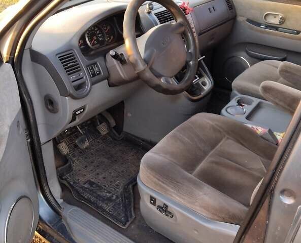 Синий Киа Карнивал, объемом двигателя 2.9 л и пробегом 240 тыс. км за 2450 $, фото 1 на Automoto.ua