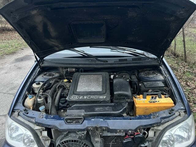 Синий Киа Карнивал, объемом двигателя 2.9 л и пробегом 260 тыс. км за 2900 $, фото 10 на Automoto.ua