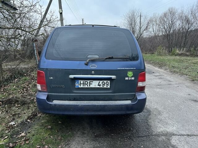 Синій Кіа Карнівал, об'ємом двигуна 2.9 л та пробігом 260 тис. км за 2300 $, фото 3 на Automoto.ua