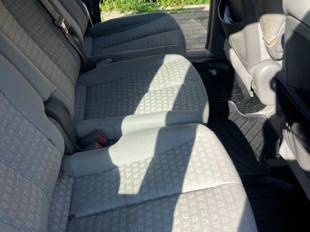 Синий Киа Карнивал, объемом двигателя 2.9 л и пробегом 350 тыс. км за 3800 $, фото 7 на Automoto.ua