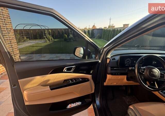 Синий Киа Карнивал, объемом двигателя 2.15 л и пробегом 105 тыс. км за 45500 $, фото 4 на Automoto.ua