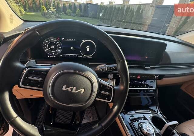 Синий Киа Карнивал, объемом двигателя 2.15 л и пробегом 105 тыс. км за 45500 $, фото 3 на Automoto.ua