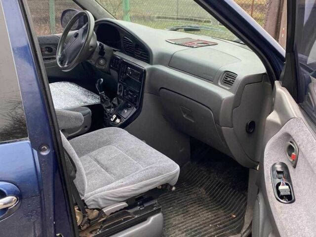 Синий Киа Карнивал, объемом двигателя 2.9 л и пробегом 328 тыс. км за 2300 $, фото 3 на Automoto.ua