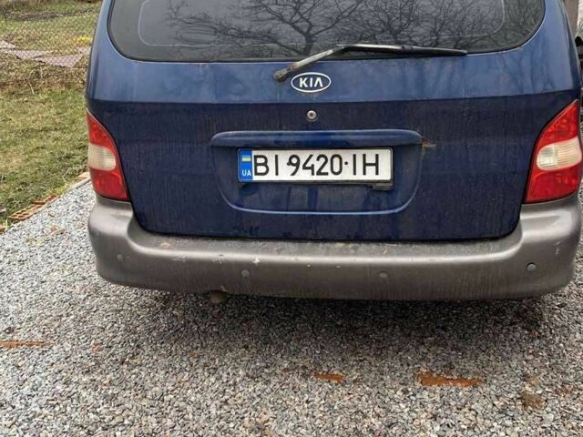 Синий Киа Карнивал, объемом двигателя 2.9 л и пробегом 328 тыс. км за 2300 $, фото 2 на Automoto.ua