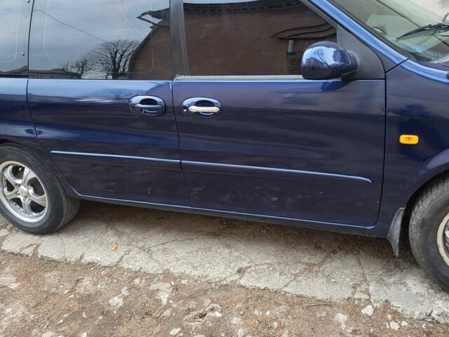 Синий Киа Карнивал, объемом двигателя 2.9 л и пробегом 3 тыс. км за 3400 $, фото 7 на Automoto.ua