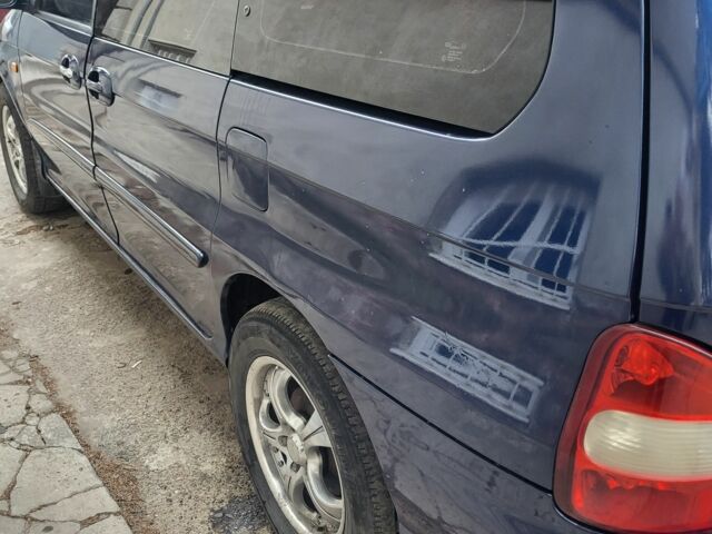 Синий Киа Карнивал, объемом двигателя 2.9 л и пробегом 3 тыс. км за 3400 $, фото 5 на Automoto.ua