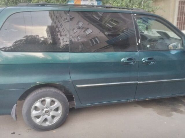 Зелений Кіа Карнівал, об'ємом двигуна 2.9 л та пробігом 200 тис. км за 2852 $, фото 4 на Automoto.ua