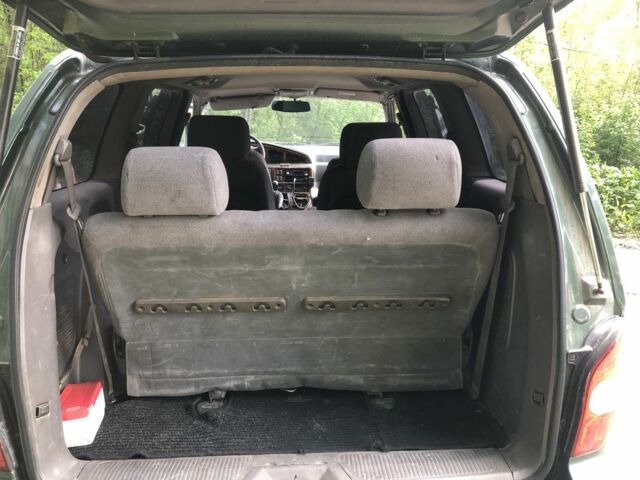 Зеленый Киа Карнивал, объемом двигателя 2.9 л и пробегом 250 тыс. км за 3200 $, фото 2 на Automoto.ua