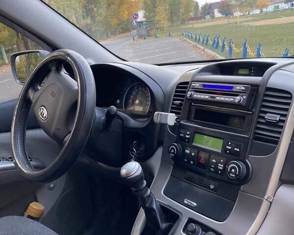 Зеленый Киа Карнивал, объемом двигателя 2.66 л и пробегом 336 тыс. км за 6299 $, фото 1 на Automoto.ua