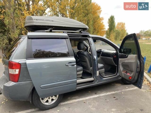 Зеленый Киа Карнивал, объемом двигателя 2.66 л и пробегом 336 тыс. км за 6299 $, фото 6 на Automoto.ua