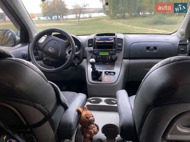 Зеленый Киа Карнивал, объемом двигателя 2.66 л и пробегом 336 тыс. км за 6299 $, фото 3 на Automoto.ua