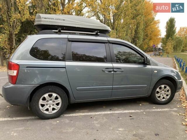 Зеленый Киа Карнивал, объемом двигателя 2.66 л и пробегом 336 тыс. км за 6299 $, фото 5 на Automoto.ua