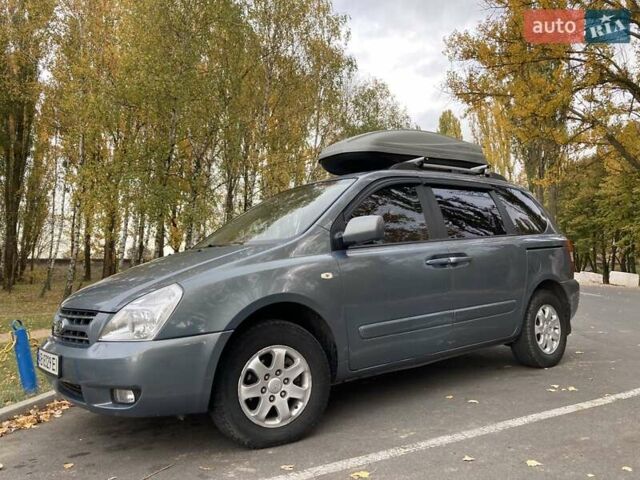 Зеленый Киа Карнивал, объемом двигателя 2.66 л и пробегом 336 тыс. км за 6299 $, фото 10 на Automoto.ua