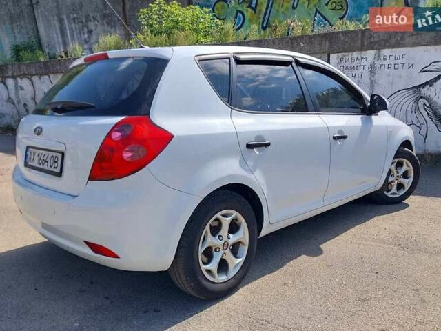 Білий Кіа Сід, об'ємом двигуна 1.4 л та пробігом 225 тис. км за 5200 $, фото 5 на Automoto.ua