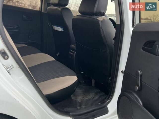 Белый Киа Сид, объемом двигателя 1.59 л и пробегом 260 тыс. км за 6500 $, фото 8 на Automoto.ua