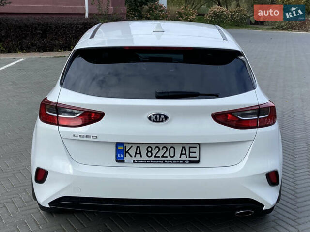 Белый Киа Сид, объемом двигателя 1.59 л и пробегом 107 тыс. км за 12350 $, фото 4 на Automoto.ua