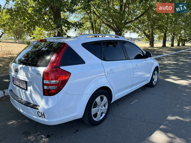 Білий Кіа Сід, об'ємом двигуна 1.4 л та пробігом 257 тис. км за 5699 $, фото 5 на Automoto.ua