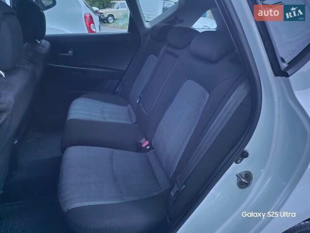 Белый Киа Сид, объемом двигателя 1.59 л и пробегом 227 тыс. км за 5999 $, фото 21 на Automoto.ua