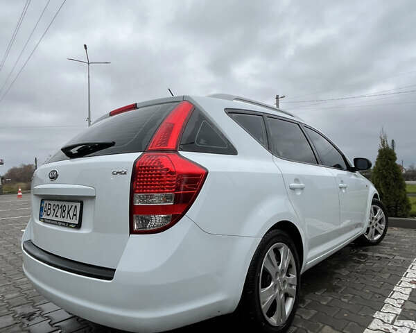 Белый Киа Сид, объемом двигателя 1.58 л и пробегом 190 тыс. км за 6500 $, фото 4 на Automoto.ua