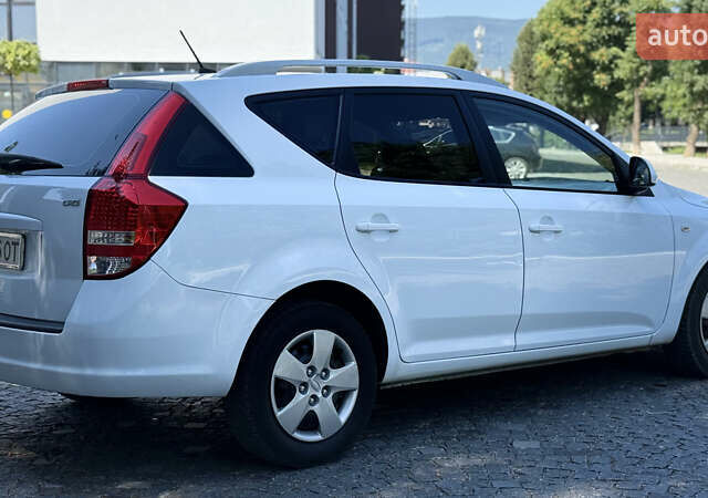 Білий Кіа Сід, об'ємом двигуна 1.58 л та пробігом 231 тис. км за 7500 $, фото 4 на Automoto.ua