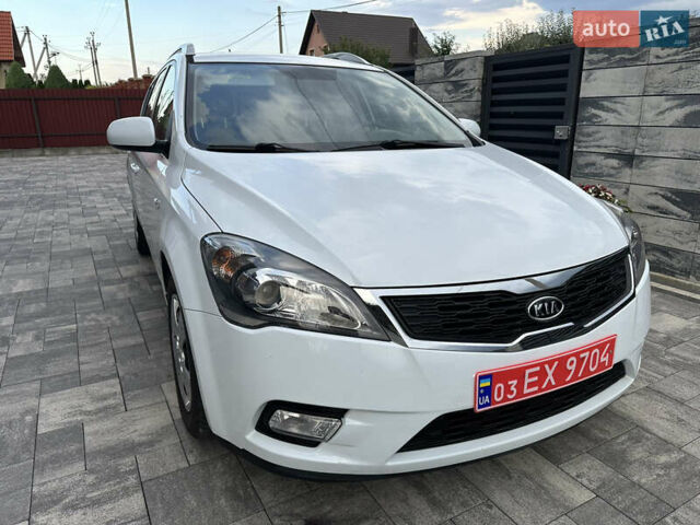 Белый Киа Сид, объемом двигателя 1.59 л и пробегом 175 тыс. км за 7200 $, фото 5 на Automoto.ua