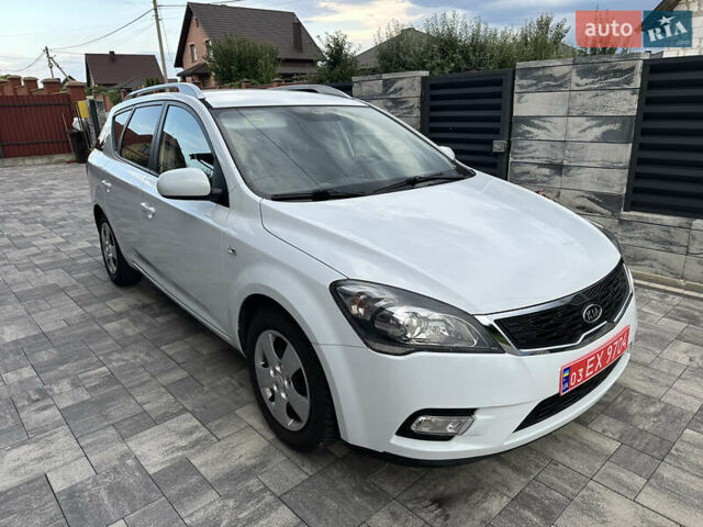 Белый Киа Сид, объемом двигателя 1.59 л и пробегом 175 тыс. км за 7200 $, фото 6 на Automoto.ua
