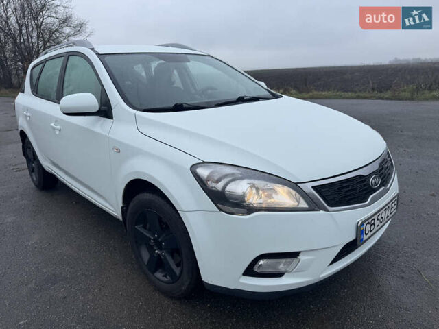 Белый Киа Сид, объемом двигателя 1.58 л и пробегом 242 тыс. км за 7000 $, фото 8 на Automoto.ua