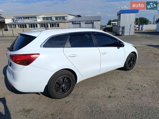 Белый Киа Сид, объемом двигателя 1.59 л и пробегом 205 тыс. км за 8500 $, фото 3 на Automoto.ua