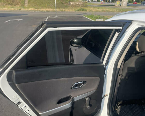 Білий Кіа Сід, об'ємом двигуна 1.6 л та пробігом 261 тис. км за 7500 $, фото 12 на Automoto.ua