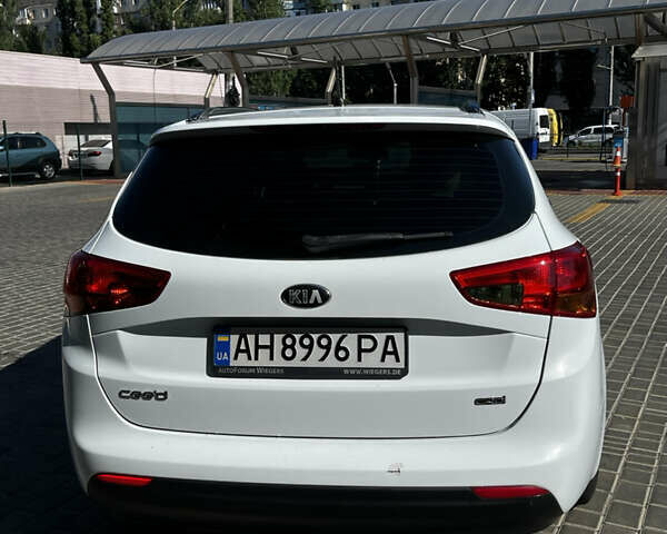 Белый Киа Сид, объемом двигателя 1.58 л и пробегом 160 тыс. км за 9400 $, фото 12 на Automoto.ua