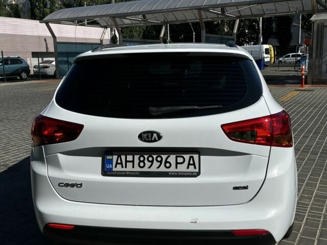 Білий Кіа Сід, об'ємом двигуна 1.6 л та пробігом 160 тис. км за 9000 $, фото 13 на Automoto.ua