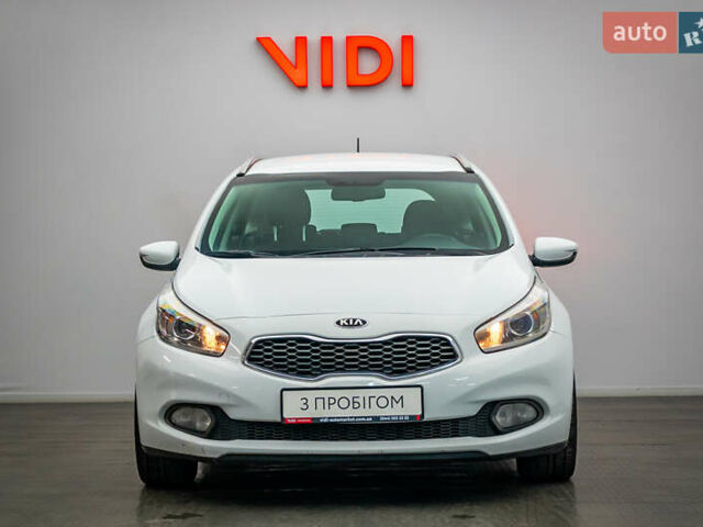 Белый Киа Сид, объемом двигателя 1.59 л и пробегом 204 тыс. км за 9622 $, фото 4 на Automoto.ua