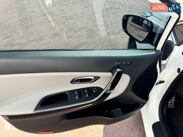 Белый Киа Сид, объемом двигателя 1.59 л и пробегом 52 тыс. км за 15000 $, фото 10 на Automoto.ua