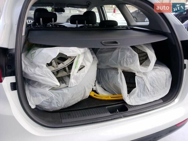 Белый Киа Сид, объемом двигателя 1.59 л и пробегом 145 тыс. км за 11800 $, фото 15 на Automoto.ua