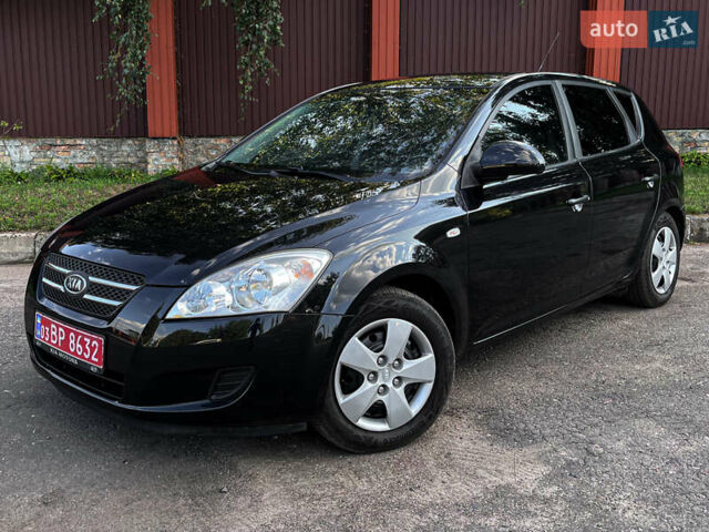 Черный Киа Сид, объемом двигателя 1.4 л и пробегом 219 тыс. км за 5800 $, фото 1 на Automoto.ua