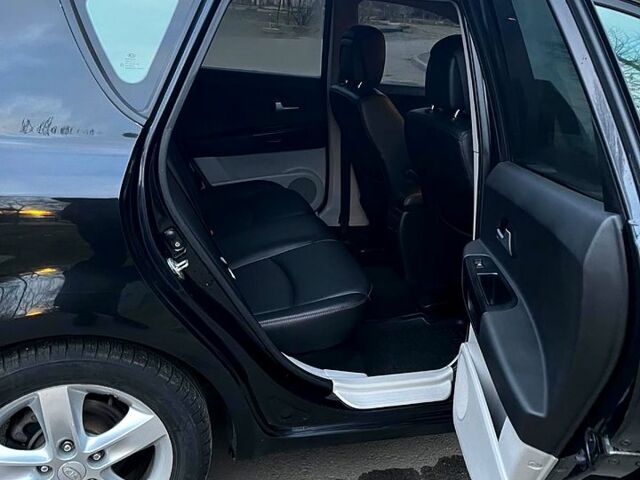 Чорний Кіа Сід, об'ємом двигуна 20 л та пробігом 143 тис. км за 7690 $, фото 5 на Automoto.ua