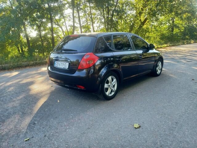 Черный Киа Сид, объемом двигателя 2 л и пробегом 275 тыс. км за 5400 $, фото 2 на Automoto.ua