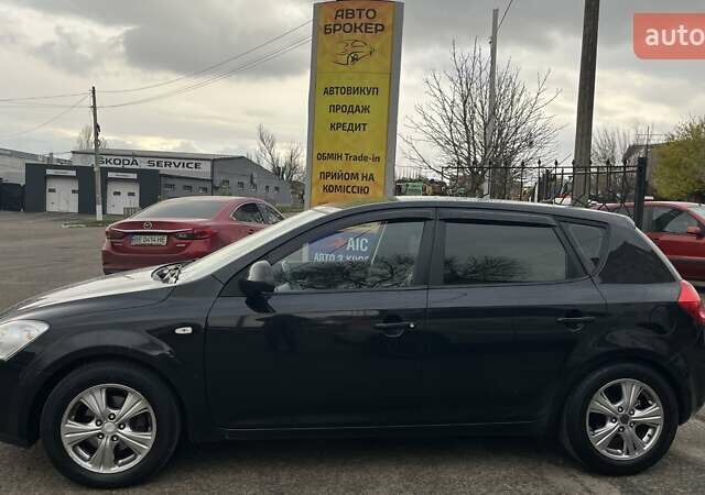 Черный Киа Сид, объемом двигателя 1.6 л и пробегом 310 тыс. км за 5990 $, фото 2 на Automoto.ua