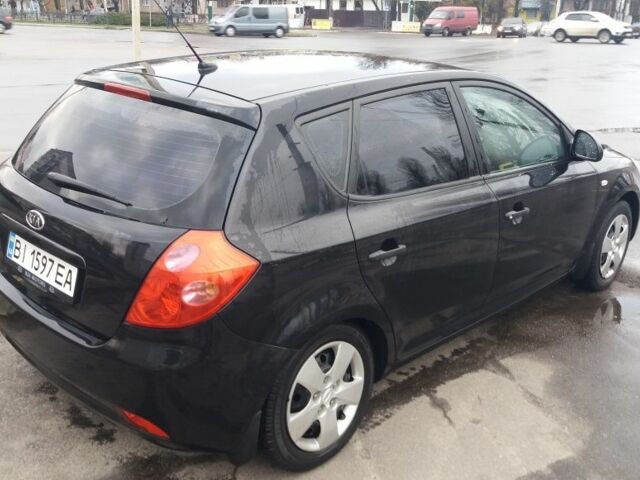 Черный Киа Сид, объемом двигателя 1.4 л и пробегом 255 тыс. км за 4971 $, фото 4 на Automoto.ua