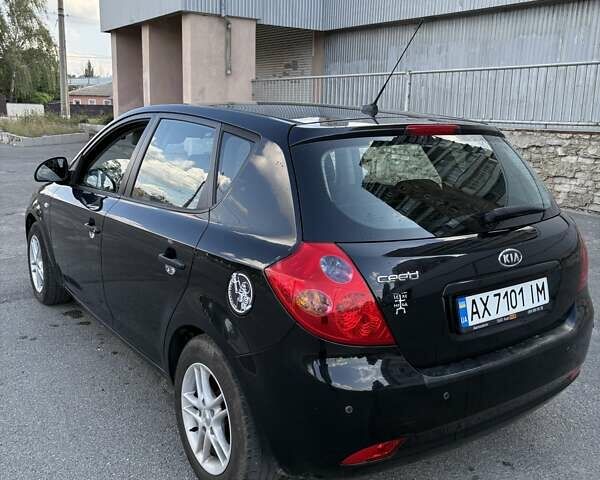 Чорний Кіа Сід, об'ємом двигуна 1.4 л та пробігом 204 тис. км за 4700 $, фото 3 на Automoto.ua