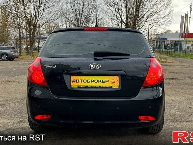 Чорний Кіа Сід, об'ємом двигуна 1.6 л та пробігом 310 тис. км за 5990 $, фото 4 на Automoto.ua